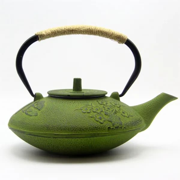 Flat green teapot