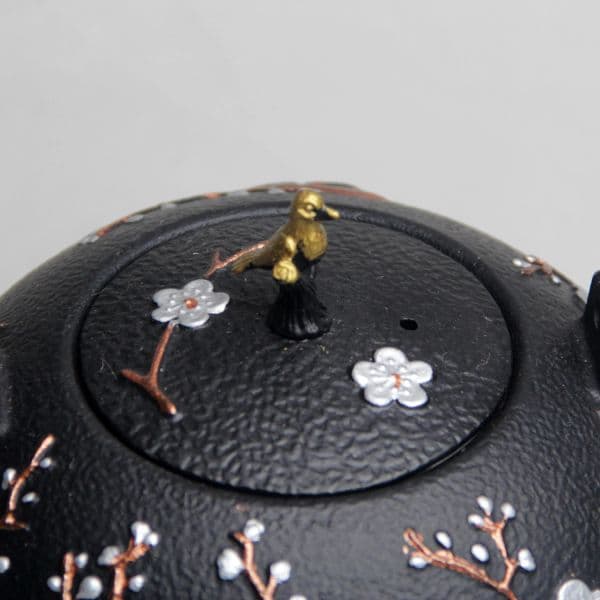 Bird on plum teapot — view 4